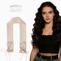 Lunara heatless curling band in beige with a model with wavy hair